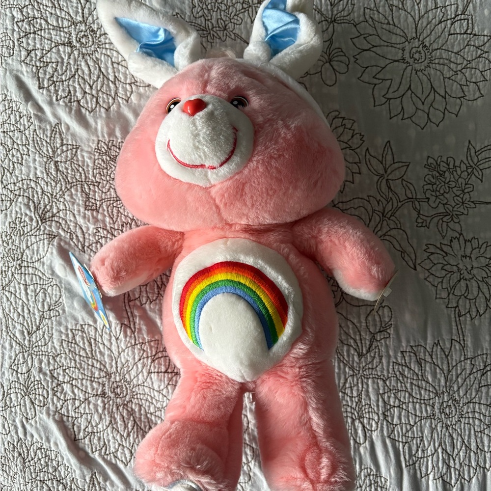 Pink and White Stuffed Bear with Rainbow Belly